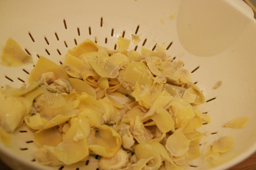 Then add in a can of drained, non-marinated artichoke hearts.